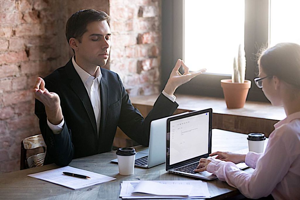 Psychological well-being in the workplace: a $20 billion problem that has companies turning to outsource HR: 15 risk-factors, 30 helpful tips 2 Meditating in workplace laptop stress mental health Pivotal HR Solutions Blog
