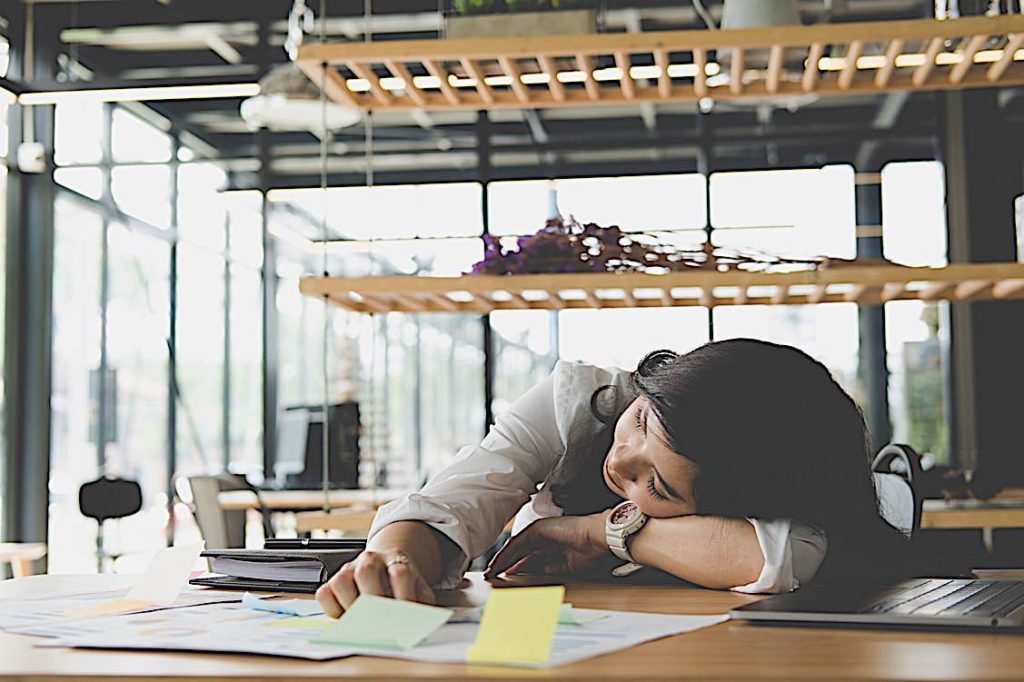 Sleeping at desk Pivotal HR Solutions Blog