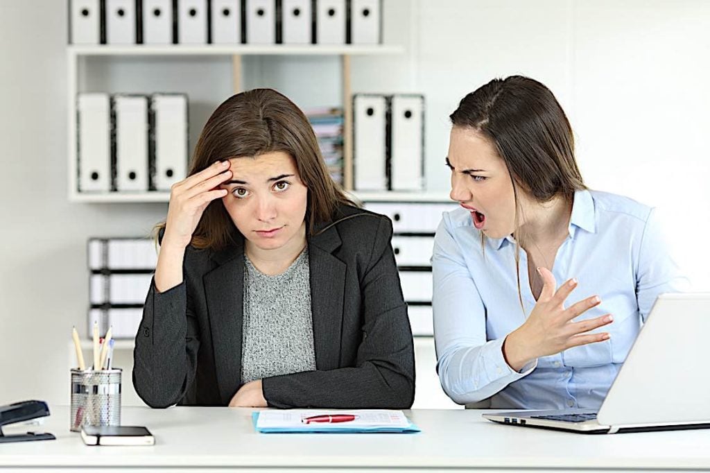 Yelling at work workplace agression dreamstime l 116043690 Pivotal HR Solutions Blog