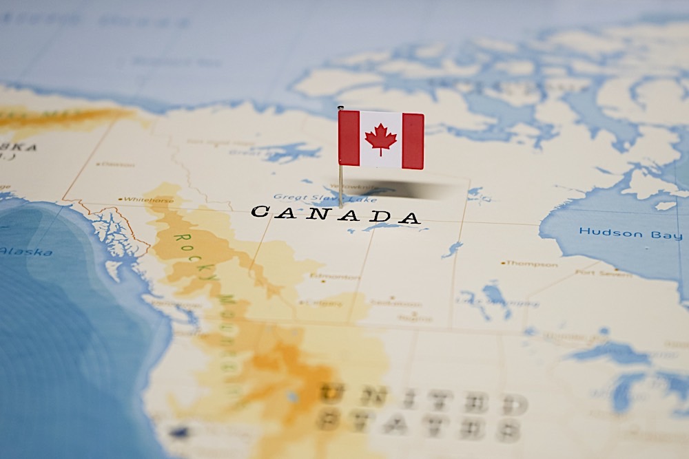 Why EOR, Employer of Record, may be the solution for rapid scaling up in the Canadian Market 2 Canadian flag on mapdreamstime xl 140228548 Pivotal HR Solutions Blog
