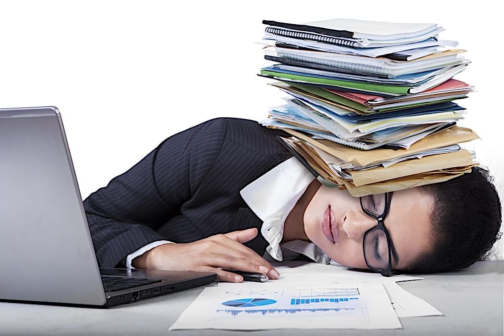 Overworked Manager concept dreamstime xl 49050479 Pivotal HR Solutions Blog