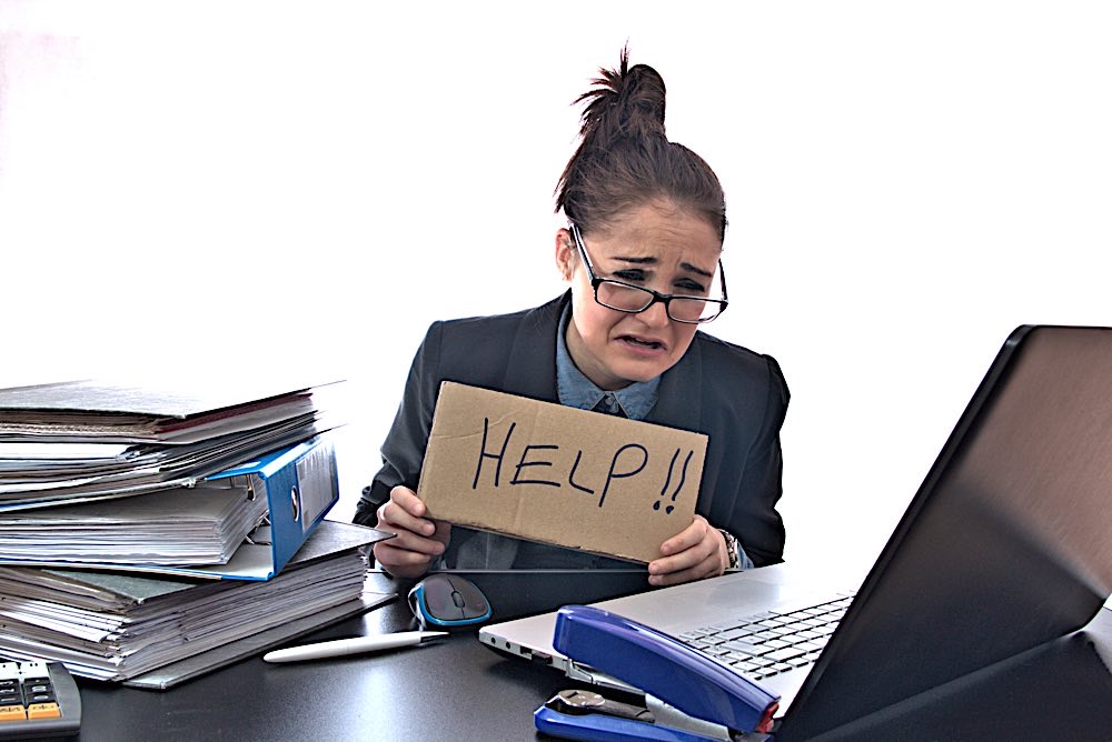 Overworked help dreamstime xl 84605211 Pivotal HR Solutions Blog