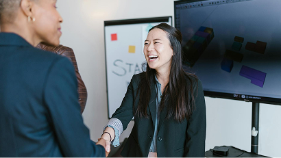 Woman in Black Blazer Smiling