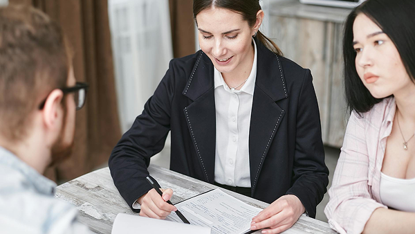 A Woman Explaining to Her Client