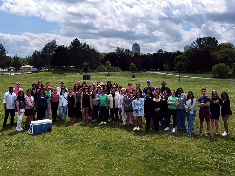 Pivotal Team Posing Outside