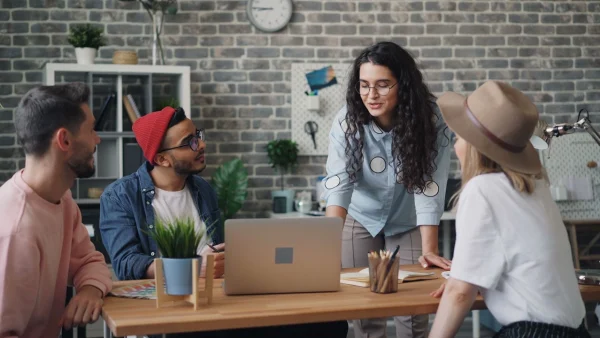 Group of creative professionals discussing ideas by Vitaly Gariev on Pexels